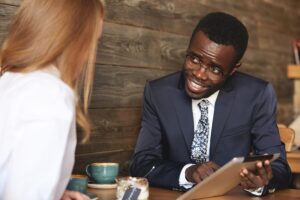 <a href="https://www.freepik.com/free-photo/coworkers-sitting-cafe-dressed-formally_10324284.htm#query=manager%20and%20client%20black&position=4&from_view=search&track=ais&uuid=b44e73b6-3bc1-42d6-bda0-5a7c8a2f0b44">Image by wayhomestudio</a> on Freepik